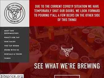 bythehornsbrewing.com