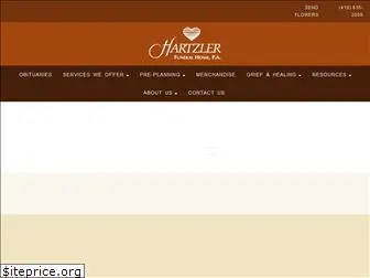 hartzlerfuneralhome.com