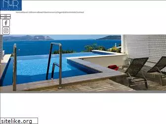 nurbeachhotel.com