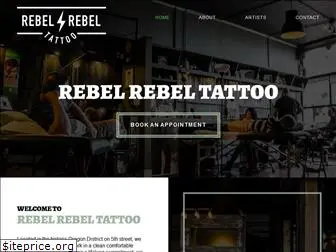 rebelrebeltattoo.com