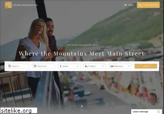 treasuremountaininn.com