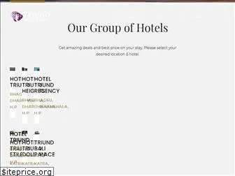 triundhotels.com