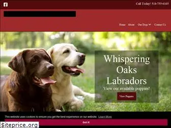 whisperingoakslabradors.com